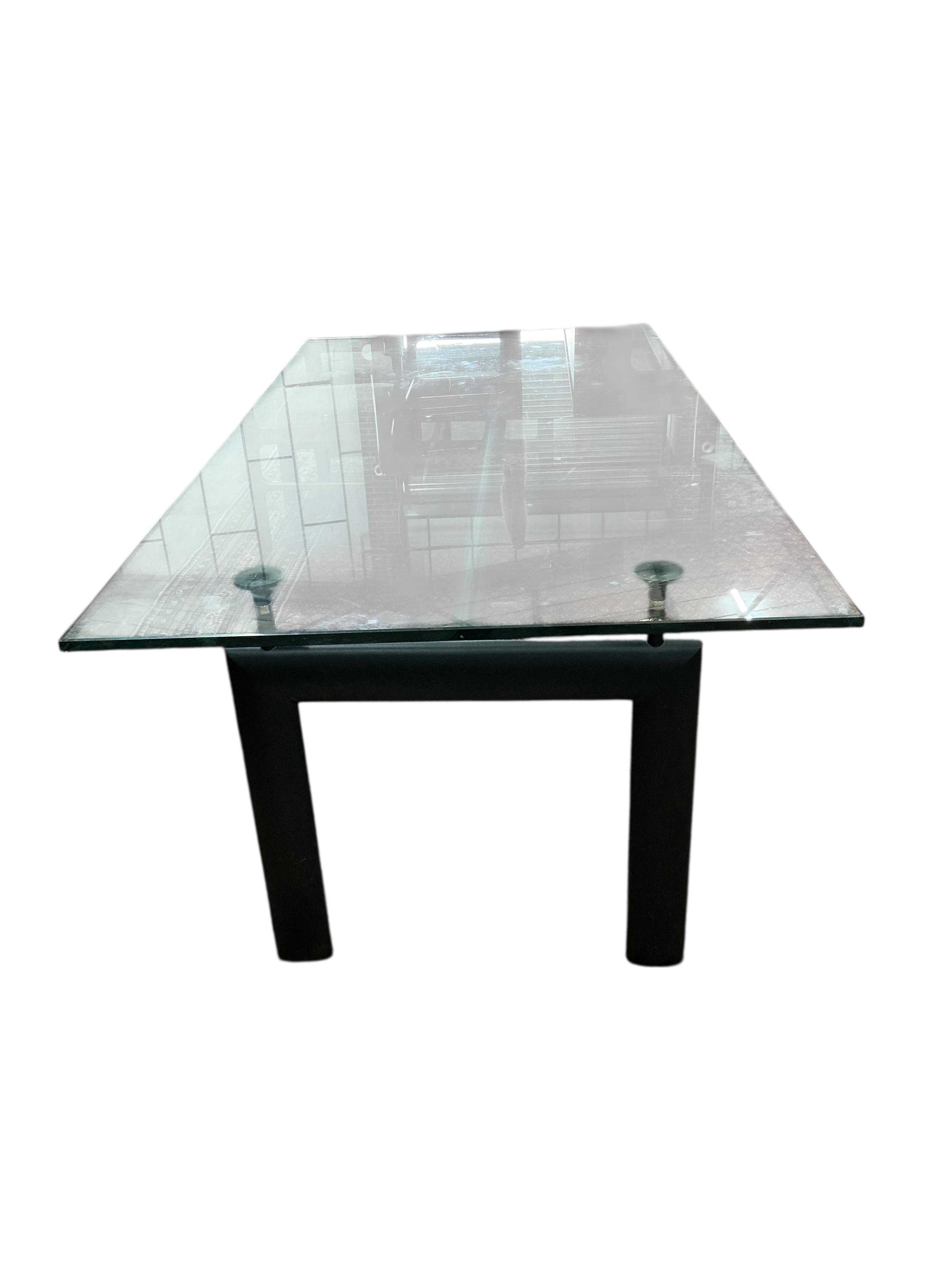 A Corbusier design LC6 style dining table with a glass top, width 200cm, depth 100cm, height 72cm